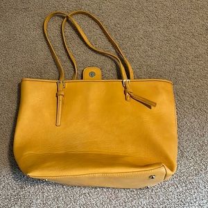 Urban brand yellow handbag.